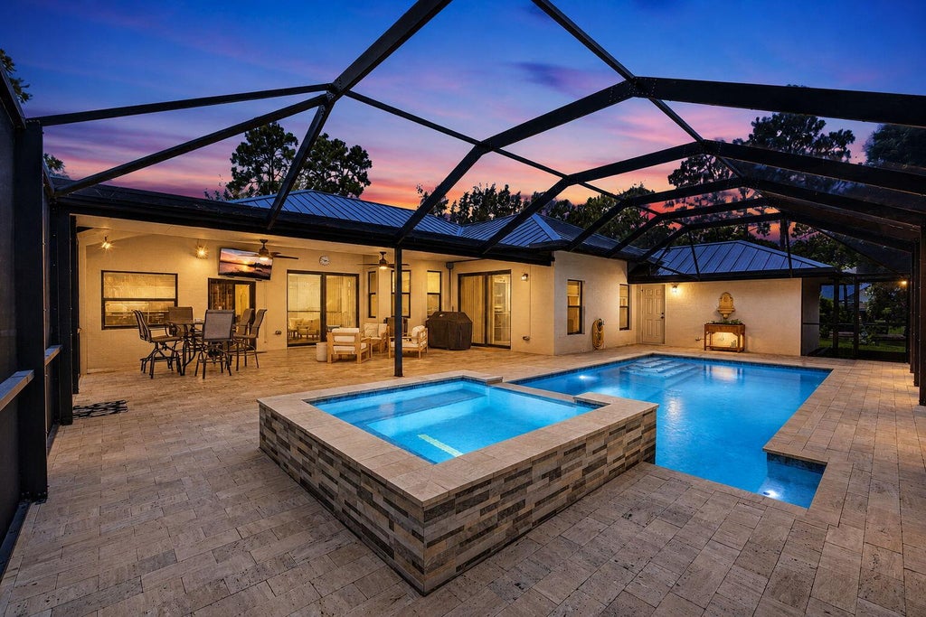 Photo of 17377 W ALAN BLACK Boulevard, The Acreage, FL 33470 (MLS # B26060929)