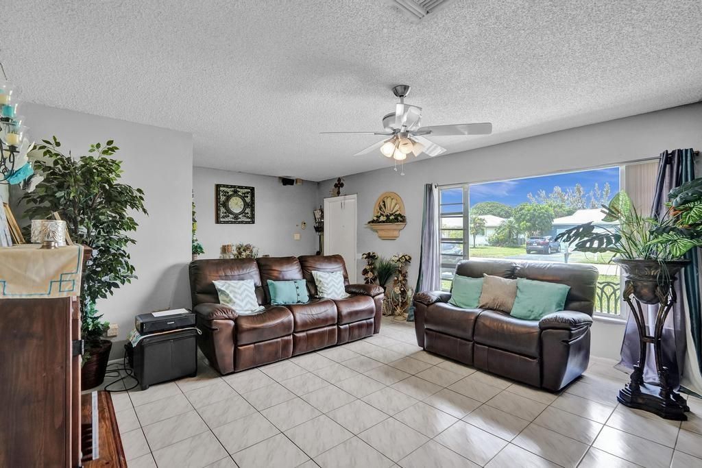 Photo of 9516 NW 80th Ct, Tamarac, FL 33321 (MLS # F10543055)
