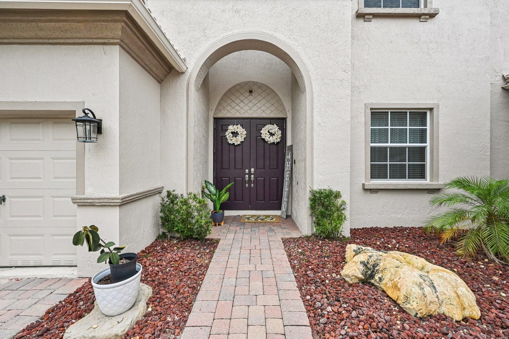 Photo of 1779 Palisades Drive, West Palm Beach, FL 33411 (MLS # B26037784)