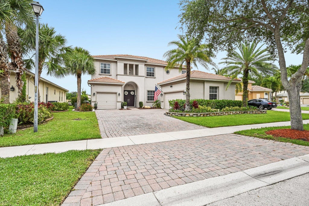 Photo of 1779 Palisades Drive, West Palm Beach, FL 33411 (MLS # B26037784)