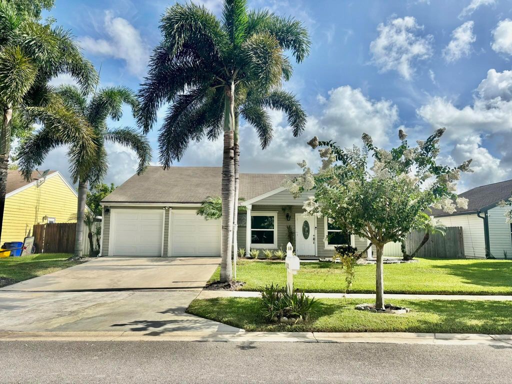 Photo of 7927 Bishopwood Road, Lake Worth, FL 33467 (MLS # R11099800)