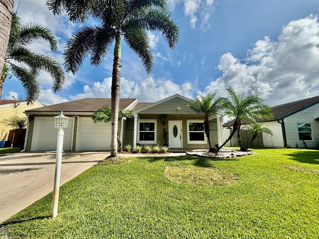 Photo of 7927 Bishopwood Road, Lake Worth, FL 33467 (MLS # R11099800)