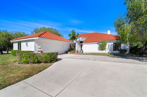 Photo of 3000 Conifer Drive, Fort Pierce, FL 34951 (MLS # R11165103)