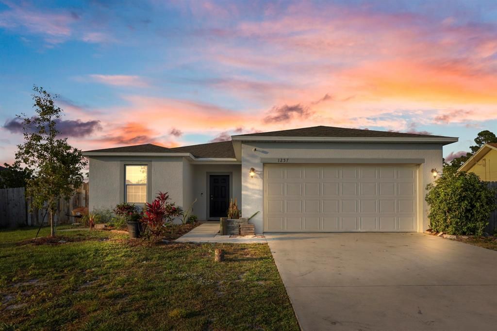 Photo of 1257 SW Santiago Avenue, Port St Lucie, FL 34953 (MLS # R10878233)