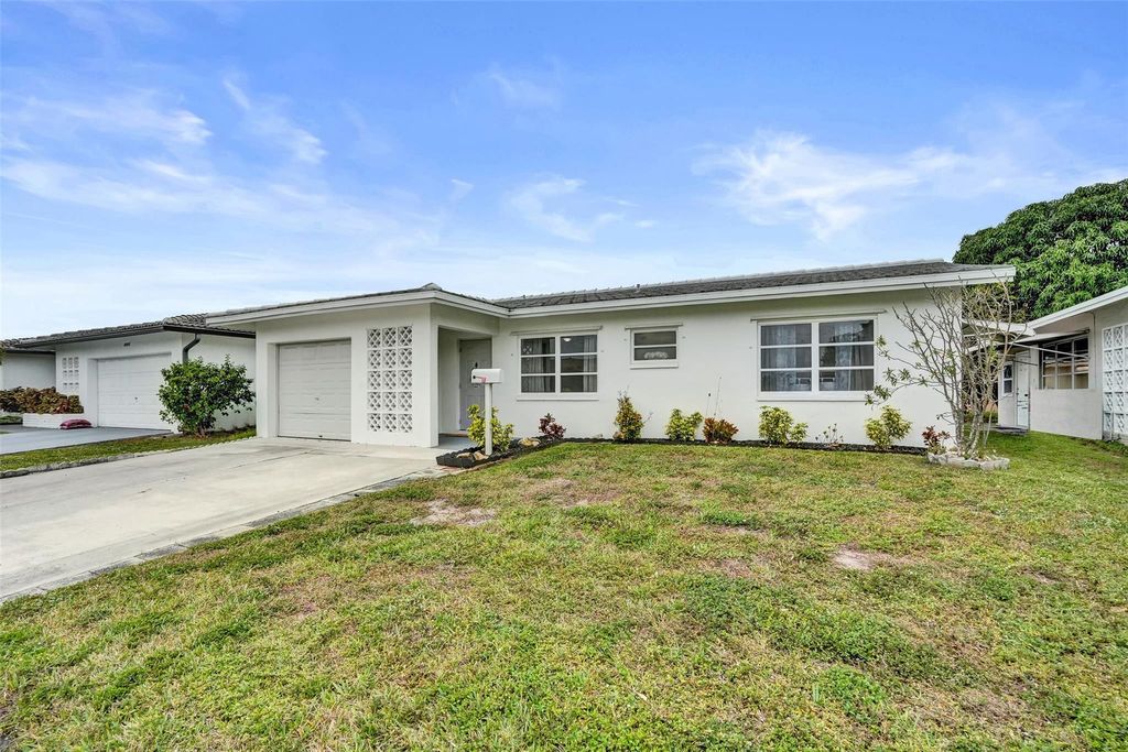 Photo of 4953 NW 48 Avenue, Tamarac, FL 33319 (MLS # F10550056)