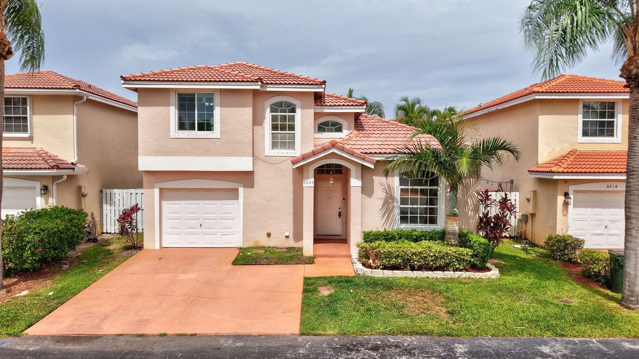 Welcome Home!! This two story 3 bedroom, 2.5 bath home located in Coconut Creek has been freshly painted and has a fenced back yard with a screened patio, partial pavers as well as a playground area. The Primary Bedroom is on the 1st floor with a large walk-in closet with built-in shelving. Located close to schools, parks and shopping.
NO HOA Approval, low monthly fees, $137.00. Pets are welcome. The garage has been partially modified to include a playroom/office, this can easily be converted back to a full 1 car garage. Impact windows on 2nd floor, shutters for 1st floor. Enjoy all that living in Coconut Creek has to offer!