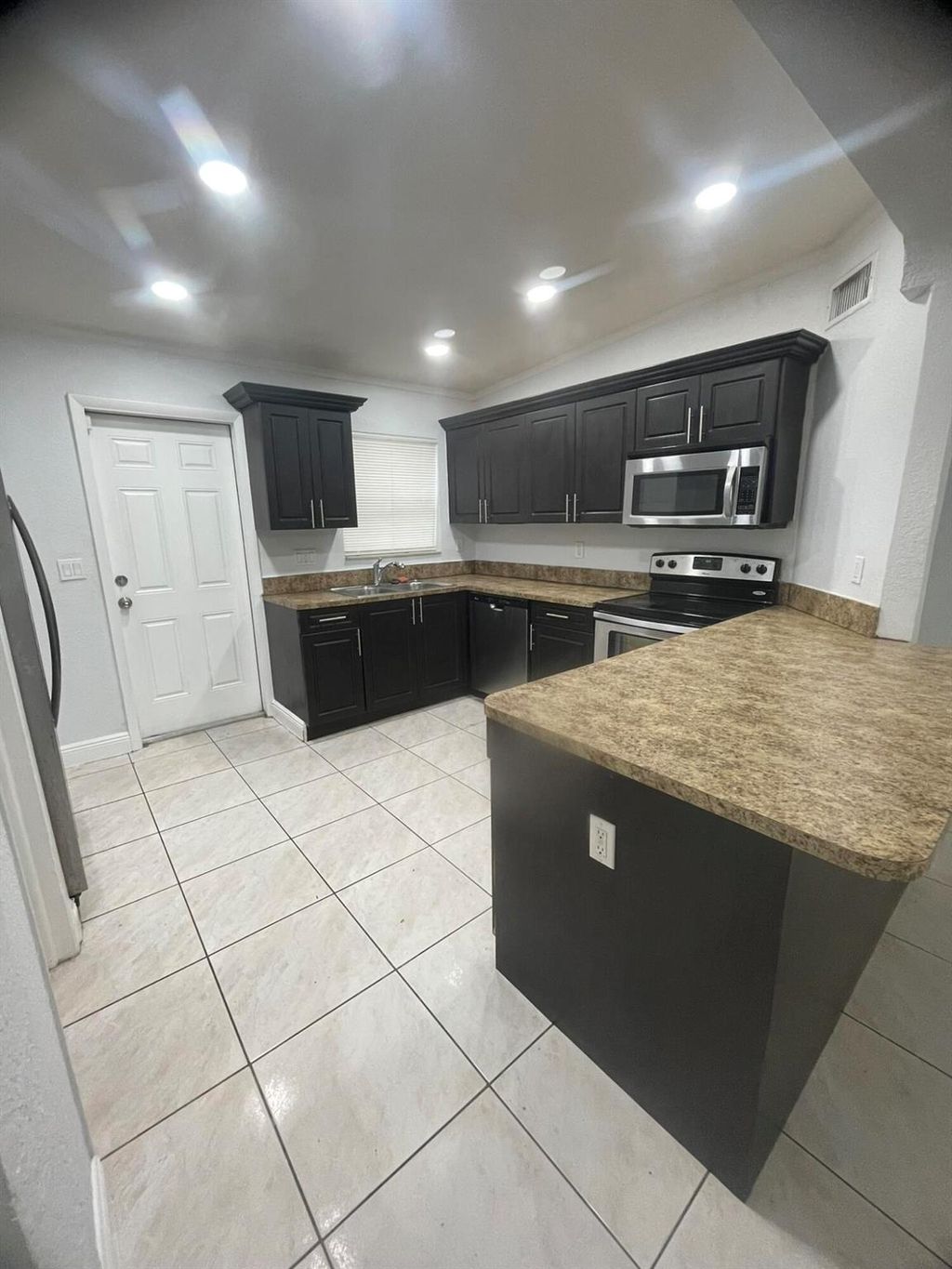 Photo of 521 Brown Road, Lake Worth, FL 33462 (MLS # R11101792)