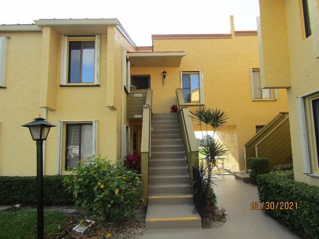 Photo of 5313 SE Miles Grant Rd #K205, Stuart, FL 34997 (MLS # F10279062)