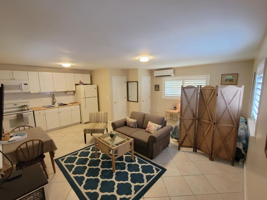 Photo of 4710 SE Compass Way, Stuart, FL 34997 (MLS # R10931216)