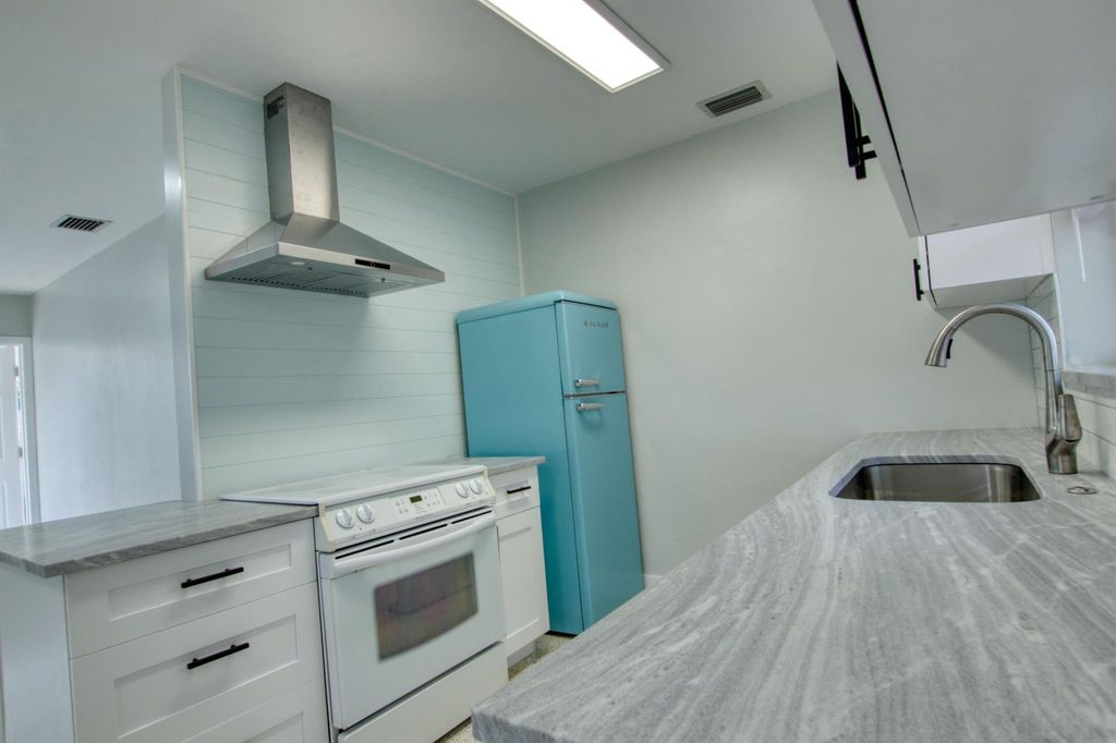 Photo of 415 S Ocean Breeze #A, Lake Worth Beach, FL 33460 (MLS # R11045111)