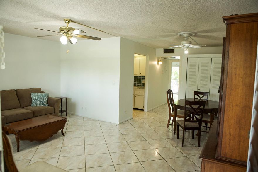 Fantastic 55+ Community! Enjoy convenient courtesy bus transportation in this wonderful one-bedroom, one-and-a-half-bathroom unit. Features include tile floor throughout and screened in balcony. Building includes laundry room, mail room and added storage space right by the elevator. Take advantage of the clubhouse, pool, spa, theater, gym, Oasis on the Green Restaurant and golf course. With 24/7 security, your comfort and safety are prioritized. Minimum credit score of 650. Monthly HOA charge is $326.52 and monthly Recreation fee is $270.76.  Come experience the best of community living!