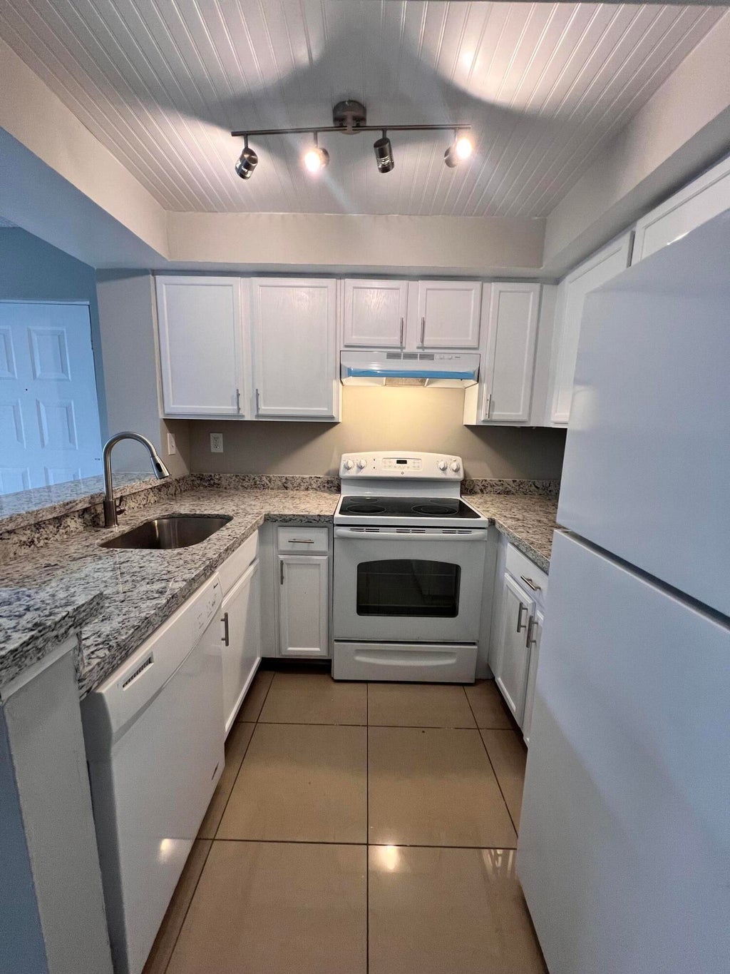 Photo of 700 EXECUTIVE CENTER Drive #211, West Palm Beach, FL 33401 (MLS # B26081138)