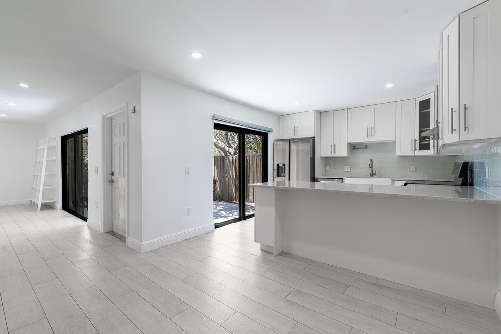 Photo of 3100 Spanish Wells Drive #B, Delray Beach, FL 33445 (MLS # F10502266)