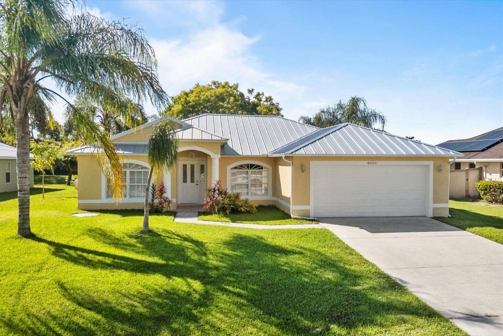 Photo of 6020 NW Wolverine Road, Port Saint Lucie, FL 34986 (MLS # R11132634)