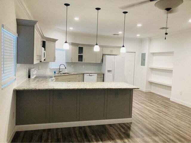 Photo of 2301 SW Barber Lane, Port Saint Lucie, FL 34984 (MLS # B26070426)