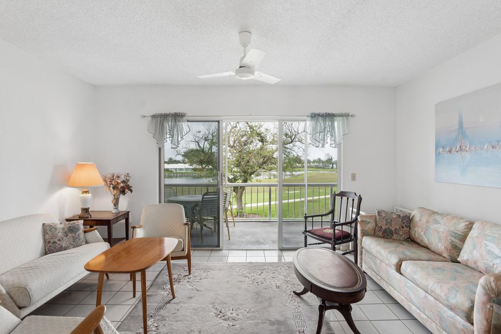 Photo of 250 John F Kennedy Drive #202, Atlantis, FL 33462 (MLS # B26026660)