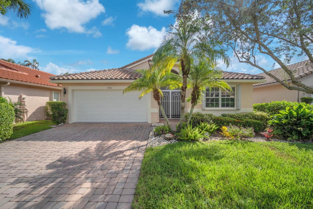 Photo of 11542 SPRING OAK Avenue, Boynton Beach, FL 33437 (MLS # B26086064)