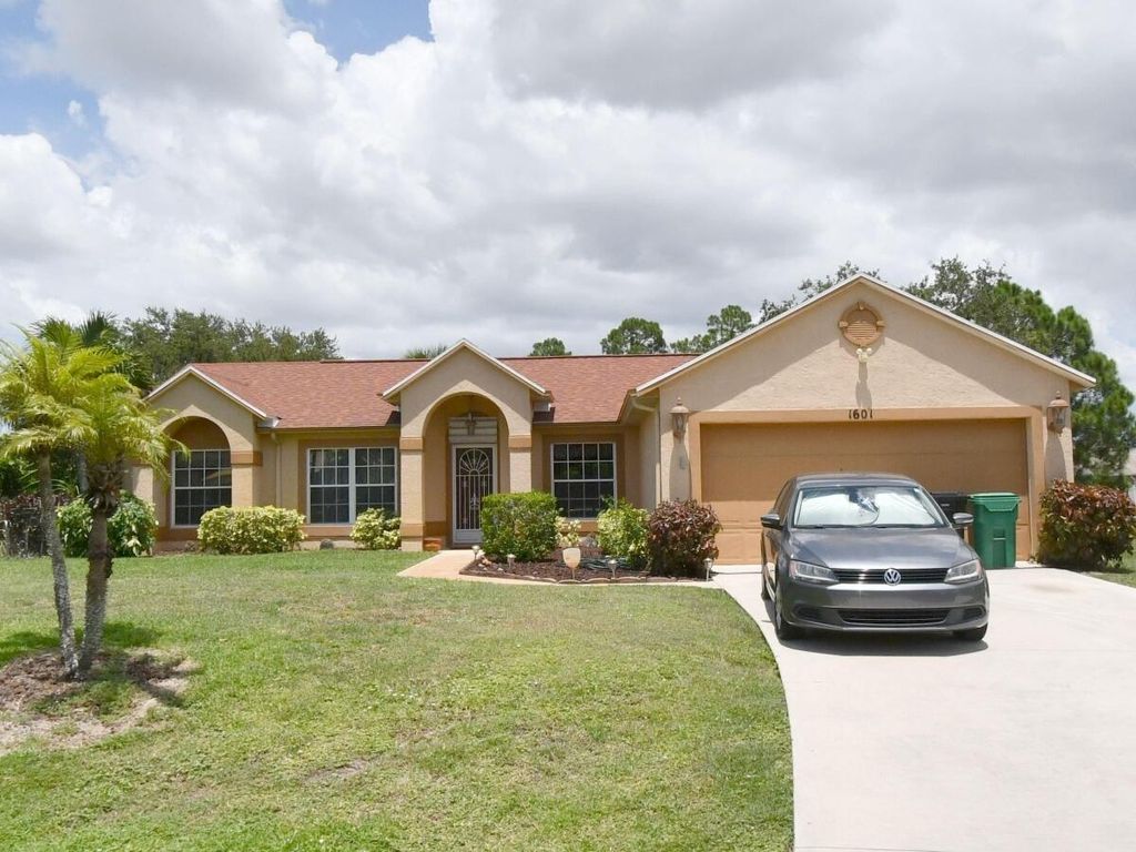 Photo of 1601 SW Duclair Avenue, Port Saint Lucie, FL 34953 (MLS # B26015223)