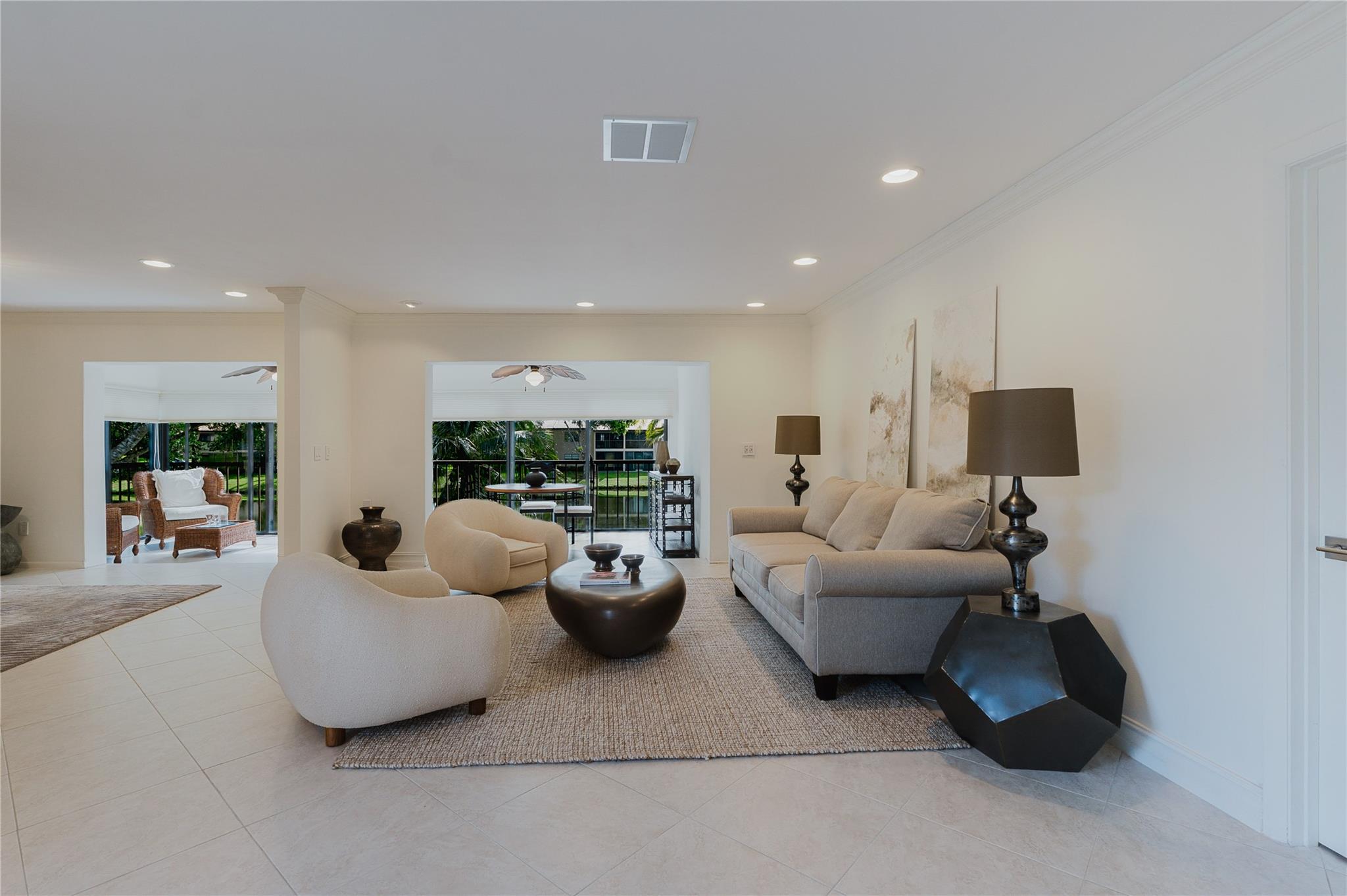 Sophisticated 3 bedroom, 2 bathroom residence in an exclusive 55+ gated Boca Raton community. Designed with spacious scale and contemporary elegance, this home offers serene pond views, refined modern finishes, and a peaceful ambiance. Ideally located just minutes from Boca's premier shopping, dining, and beaches, it delivers the perfect blend of luxury, comfort, and lifestyle. Optional Boca Lago country club membership, not required.