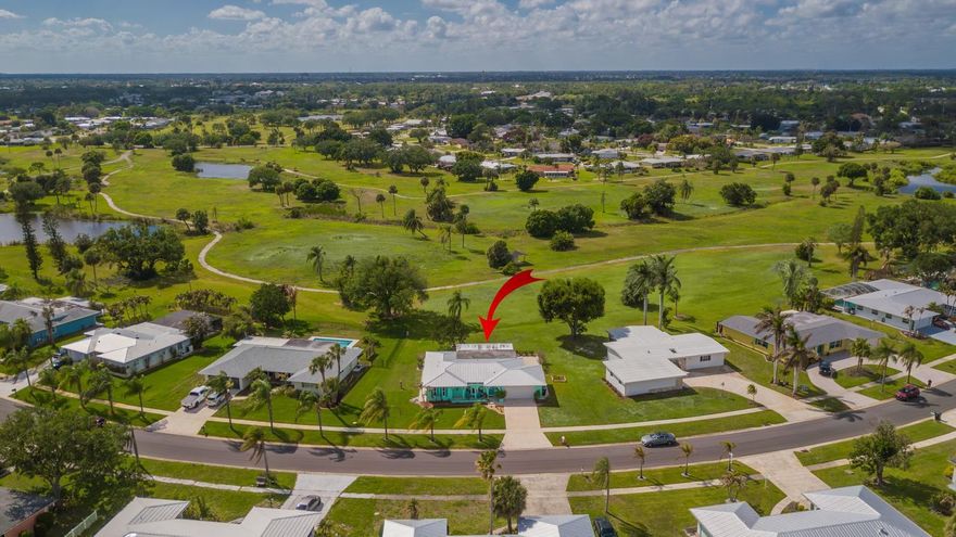 Location! Location! Location! Fantastic Opportunity To Live In The Much Sought After Sandpiper Bay Community! This Warm & Inviting Home Features A 2020 METAL ROOF, 2 Bedrooms with Remodeled Primary Bedroom Closet, 2 Full Updated Baths, Updated Kitchen Including 2025 LG Refrigerator & Range, TWO Car Garage With 2024 Hurricane Rated Door, Screened In Patio With View of The Sandpiper Bay Resorts Green Space. Updated Tile Throughout with Carpet In Bedrooms. New A/C & Ductwork Installed 2016. NO HOA! PARK YOUR BOAT, RV, TRAILER! Sandpiper Bay Is Home To The Port District On The North Fork of The Saint Lucie River At The Port Saint Lucie Botanical Gardens W/River Walk, Canoe/Kayak Launch, Playground, Music Venue. Close To Shopping, Restaurants, Hutchinson Island Beaches. Miles of Hiking Trails.