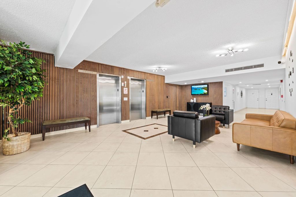 Photo of 3960 Oaks Clubhouse Drive #304, Pompano Beach, FL 33069 (MLS # B26016736)