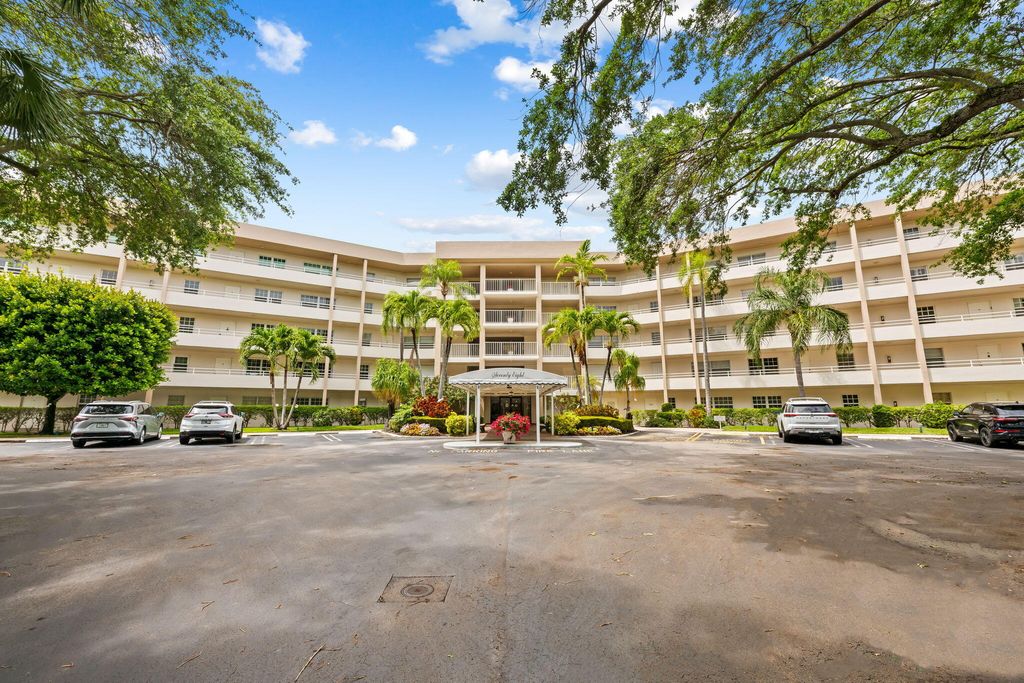 Photo of 3960 Oaks Clubhouse Drive #304, Pompano Beach, FL 33069 (MLS # B26016736)