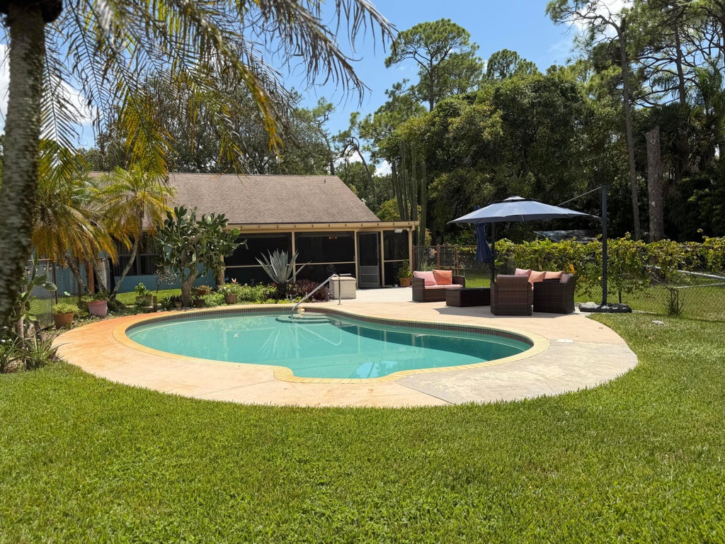 Photo of 13881 42nd Road N, West Palm Beach, FL 33411 (MLS # B26065884)