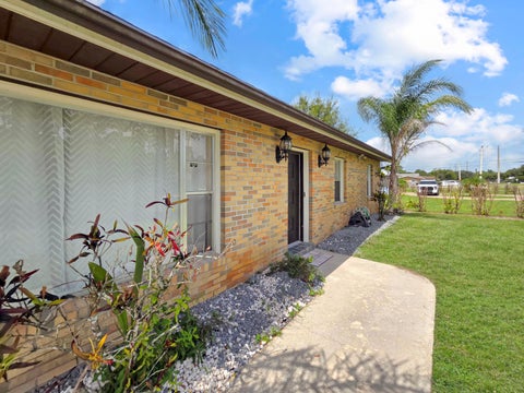 Photo of 801 W WEATHERBEE Road, Fort Pierce, FL 34982 (MLS # B26054674)