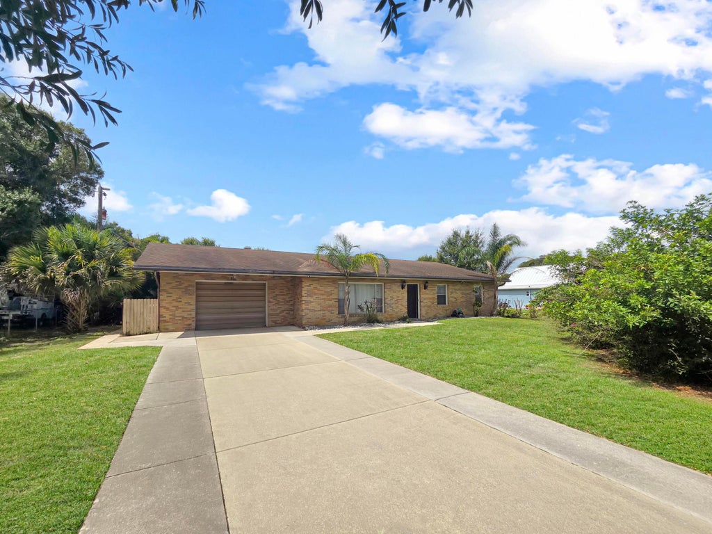 Photo of 801 W WEATHERBEE Road, Fort Pierce, FL 34982 (MLS # B26054674)