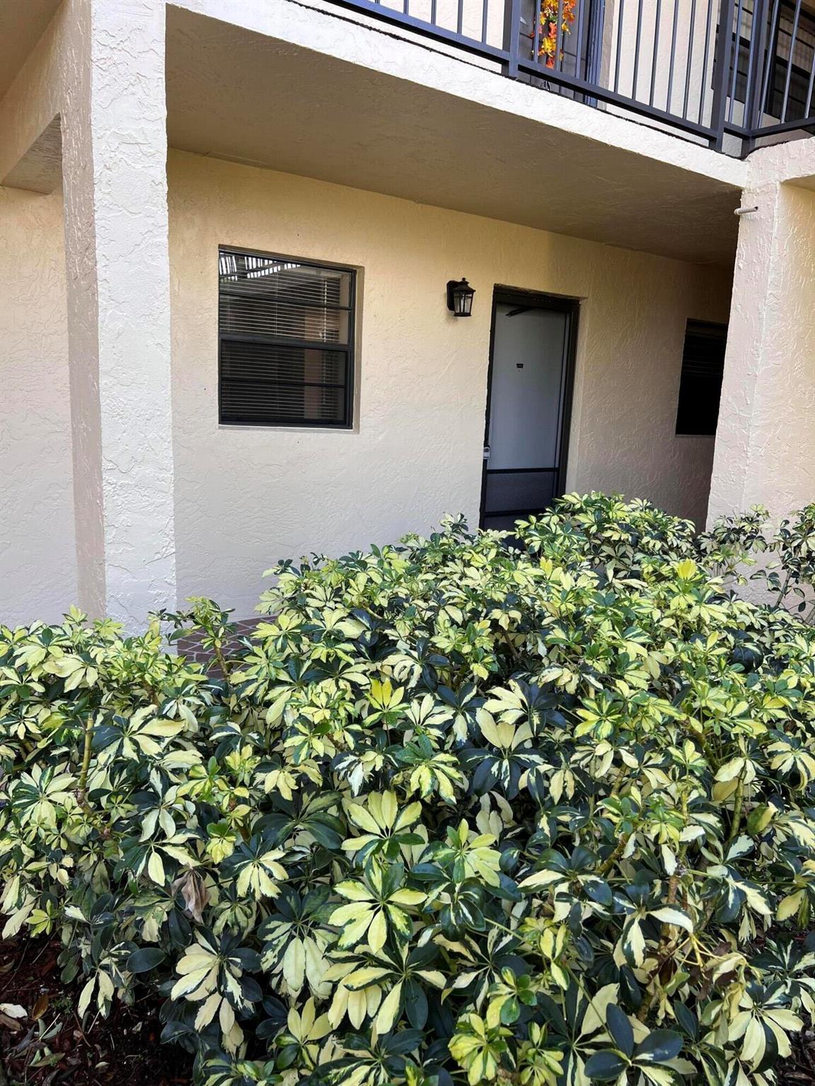 2 bedroom condo with a lake view on the ground floor, walk around the many lakes or to the community pool. Enjoy the breeze in the afternoon in the screened patio with a view of the lake. The building has laundry on each floor. All gated community with plenty of trees and walkways around. Tiled and carpet in the bedrooms. There is a new refrigerator in the unit and ceiling fans in all rooms.
