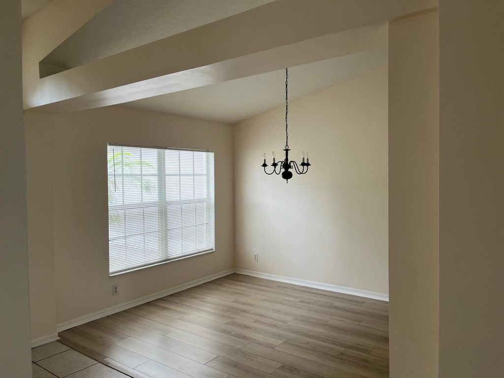 Photo of 981 SW Versailles Avenue, Port Saint Lucie, FL 34953 (MLS # R11087042)