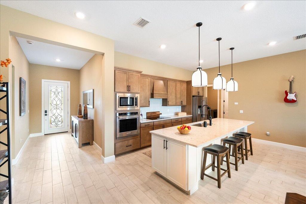 Photo of 9941 SW Legacy Drive, Stuart, FL 34997 (MLS # R11129645)