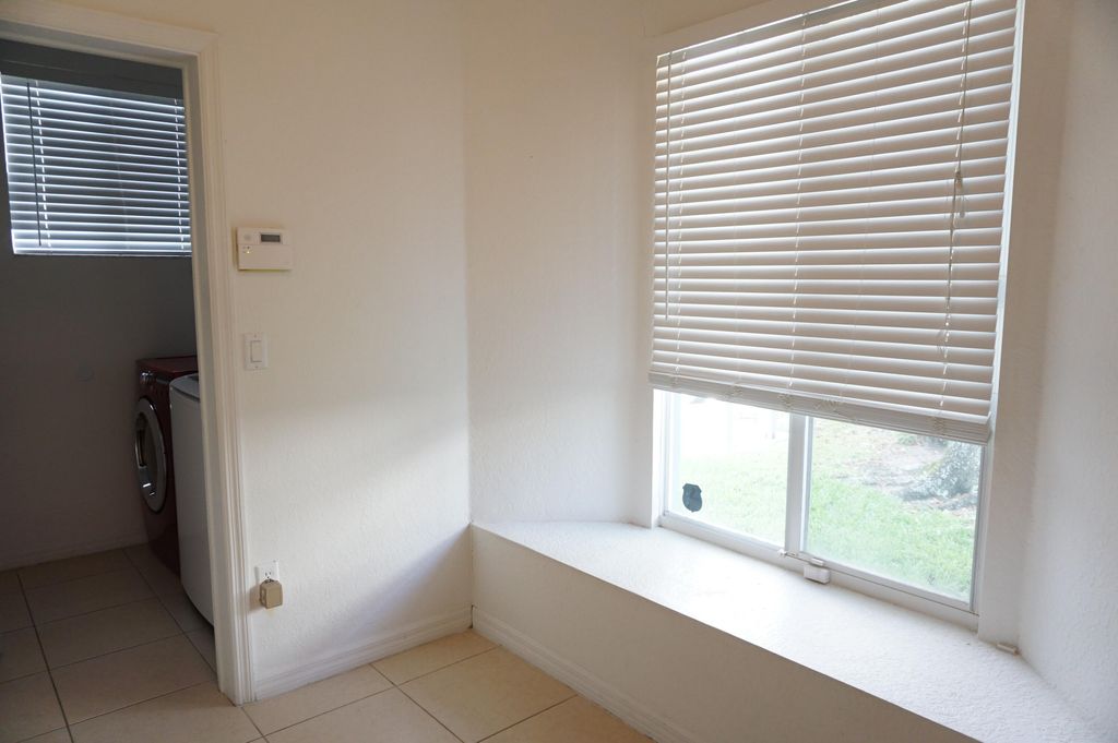 Photo of 1923 Alamanda Way, Riviera Beach, FL 33404 (MLS # R10990525)