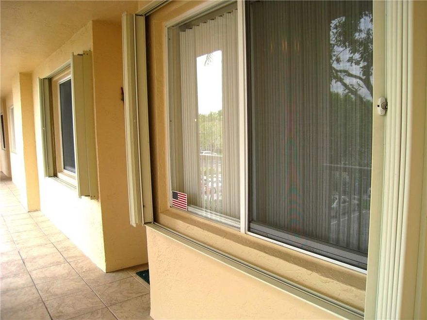 HURRICANE SHUTTERS ALL AROUND AND TEMPERED GLASS WINDOWS ON PATIO!  BRAND NEW A/C AND NEWER WATER HEATER.  ALL WHITE WALLS, NO WALLPAPER TO REMOVE.  CERAMIC TILES ON PATIO OVERLOOKING WIDE LAKE.  ENJOY ALL THE KINGS POINT AMENITIES, INCLUDING MANY CLUBS, COURTESY BUSES AND THE FABULOUS PALACE THEATRE.  BEST OF ALL, CLUBHOUSE DEED IS PAID IN FULL FOR LOWER MAINTENANCE.  ASSOC. STATES 55+.