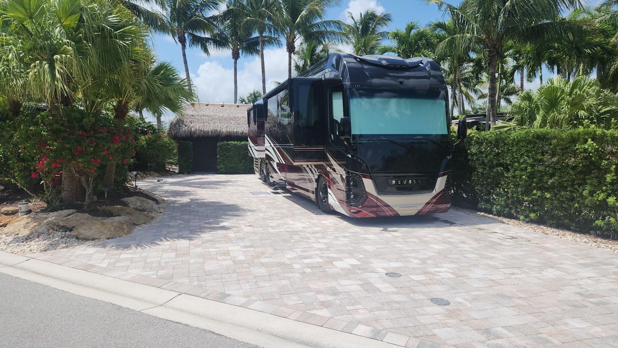 Beautiful corner pavered lot at the Motorcoach Resort of St Lucie West. Located on the golf course (14th hole) with a totally updated tiki with an amazing galley kitchen with granite counters and stainless steel appliances, Full size refrigerator, dishwasher, range, microwave, and grill. Large seating area with plenty of seating included. Tiki has electric shades, TV and lighting. Plenty of privacy. Easily park your 45'Class A only motorcoach with plenty of space for your vehicle, golf cart and more! Resort amenities in this gated community include - pools, hot tubs, tennis, pickleball, gyn, clubhouse, dog parks, and 3 par 18 hole golf to name a few! Near shops, restaurants, highways and the NY Mets training facility.