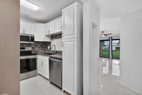 Tiny photo for 5540 Lakeside Drive #102, Margate, FL 33063 (MLS # B26057076)