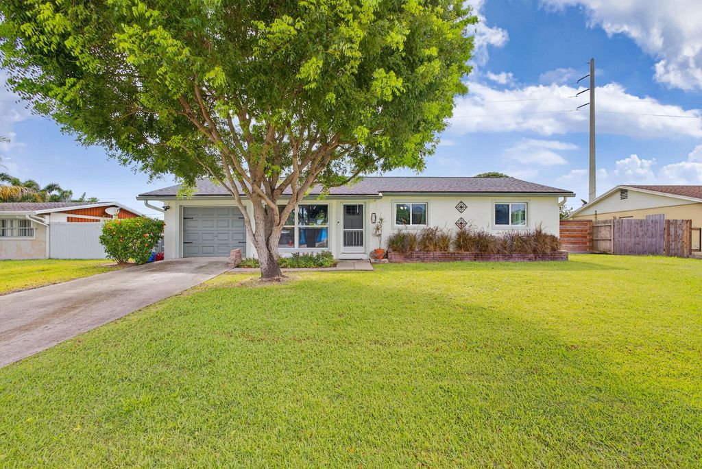 Photo of 372 E Shadyside Circle, West Palm Beach, FL 33415 (MLS # R11110649)