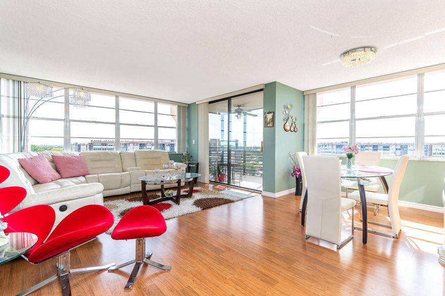 This Private Corner Residence in the Desirable 55+ community of Park Place has 1120 square feet and a very spacious and open floor plan, featuring two bedrooms and two full bathrooms. This unit encompasses expansive golf course views throughout, with a private screened in balcony to enjoy the outdoors, wood flooring throughout, with a large master bedroom. Enjoy this completely renovated kitchen encompassing upgraded stainless steel appliances, wood flooring and expansive views. Move in ready. This community features a heated swimming pool, a paved jogging/bike trail, tennis courts, a club house, courtesy buses, and much more. Conveniently located close to shopping malls, restaurants, hospitals and places of worship. Call and schedule your showing today.