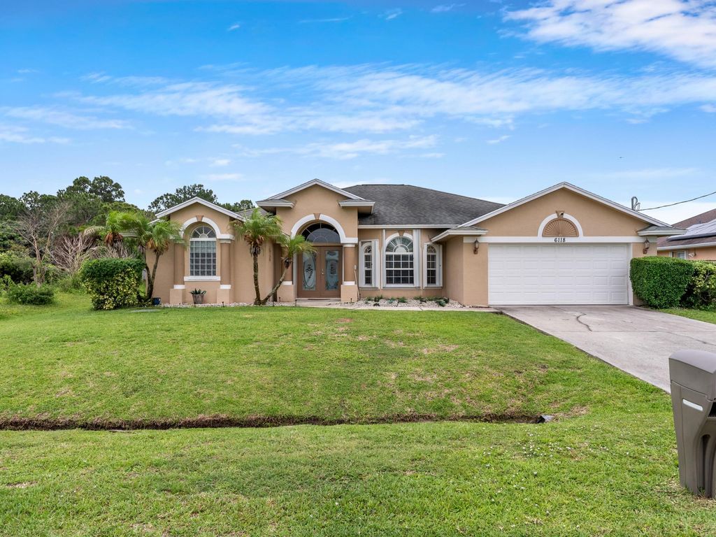 Photo of 6118 NW Ginger Lane, Port Saint Lucie, FL 34986 (MLS # B26032509)