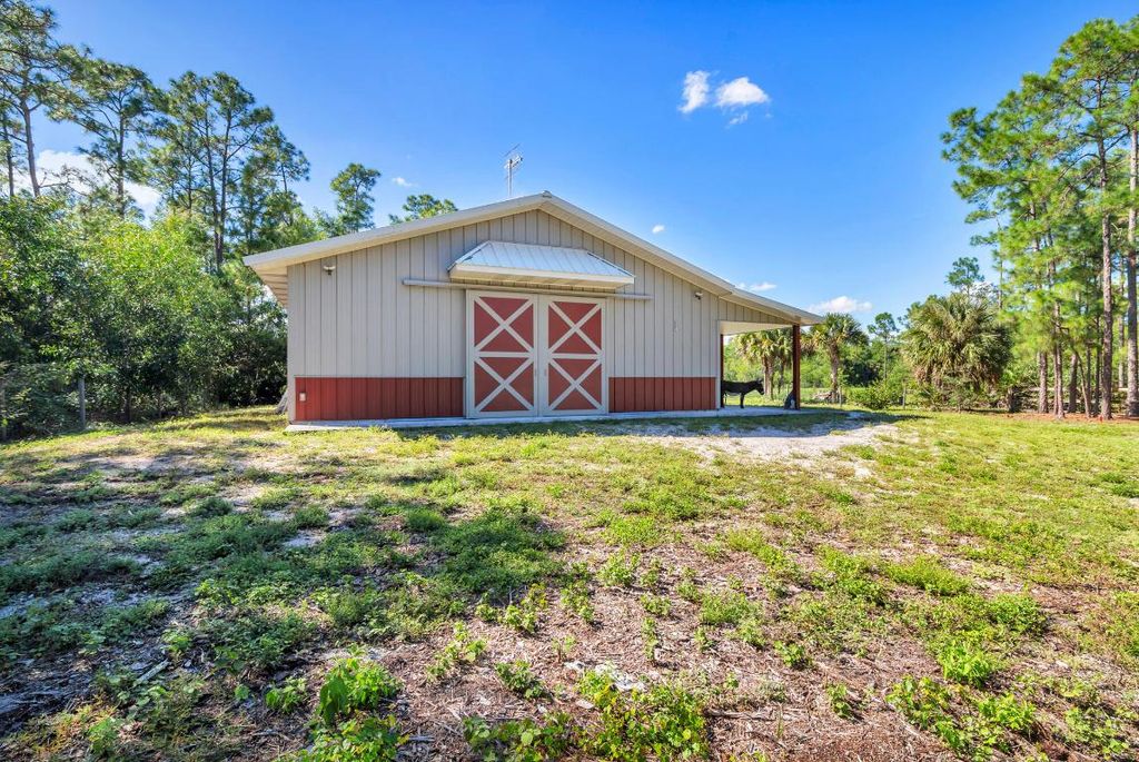 Photo of 12167 142nd Court N, Palm Beach Gardens, FL 33418 (MLS # R11134487)