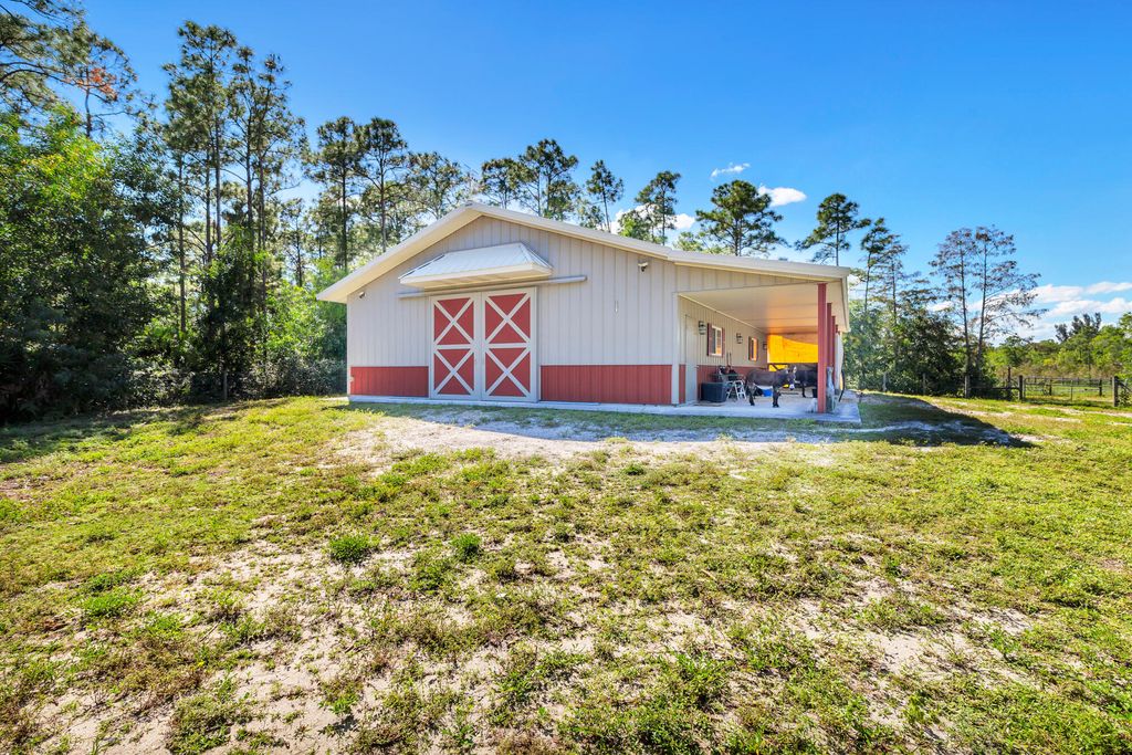 Photo of 12167 142nd Court N, Palm Beach Gardens, FL 33418 (MLS # R11134487)