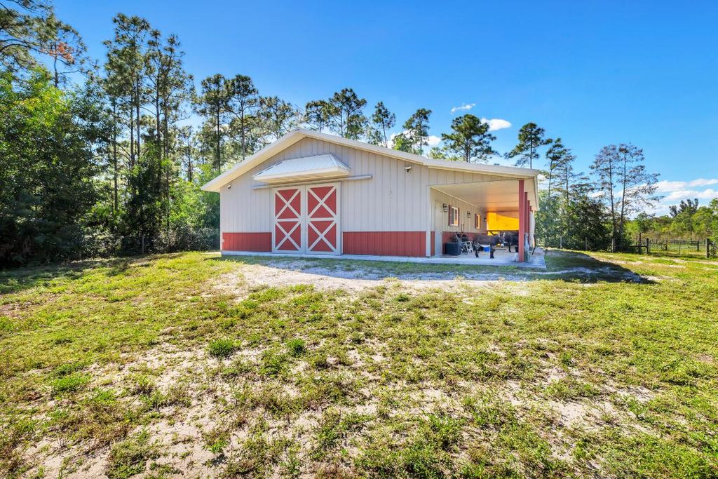 Photo of 12167 142nd Court N, Palm Beach Gardens, FL 33418 (MLS # R11134487)