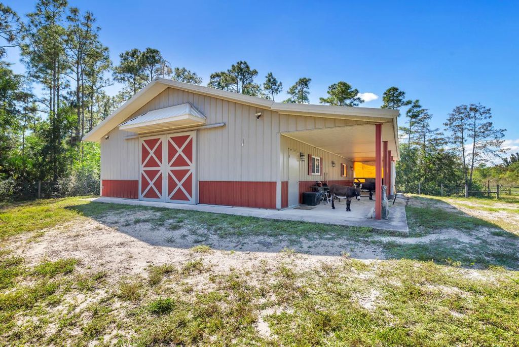 Photo of 12167 142nd Court N, Palm Beach Gardens, FL 33418 (MLS # R11134487)