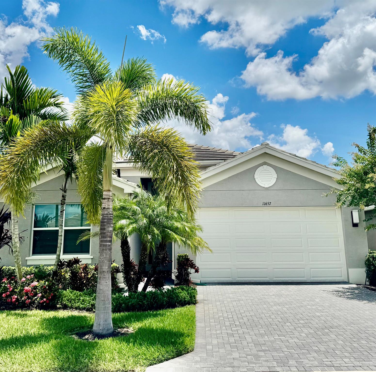 Experience breathtaking eastern lake views from this stunning & meticuluous CONTEMPORARY Heron. Numerous special features & upgrades, including WHITE GOURMET KITCHEN w/soft close cabinets. NO CDD FEES. Quarterly HOA fees access all amenities, Cay Social Clubhouse offers heated pool, new cafe, pool bar, social event room & game rooms. The Sports & STATE OF THE ART Fitness Center has multiple pools, tennis, pickleball, bocce. Enjoy classes, concerts, & a green market at the Arts & Culture Center, or explore the scenic Paseo by foot, bike, or golf cart to reach all the clubs & sports field and 2 Dog Parks.Located near The Heart of Tradition,find Aldi, fabulous new restaurants, and a new state of the art Publix at Shops of Riverland. EZ Access to I-95&hospitals,beaches,Downtown Stuar