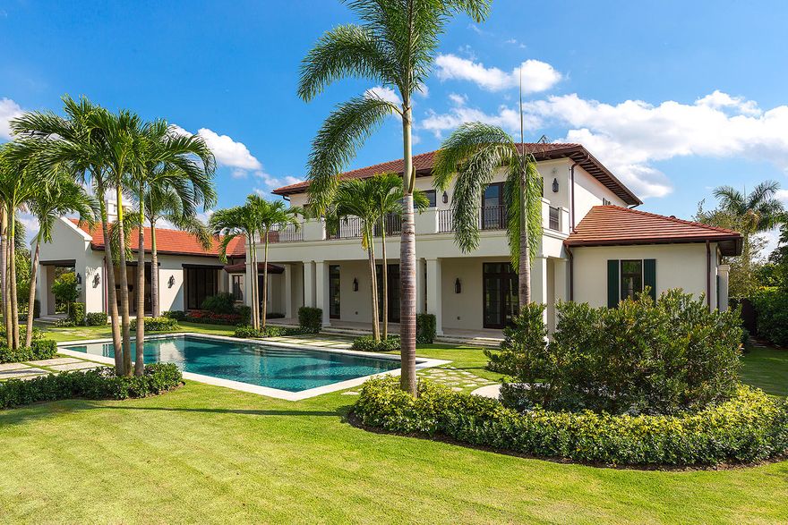 Enter the exclusive Tuscan Estate in the Cypress Island community of Palm Beach Polo and you are aware of why South Florida is an oasis of the indoor/outdoor lifestyle. Greeted by a stone facade and Monterey style balcony the home by Piper Properties and Portuondo Perotti Architects warmly invites. This new construction home has a state of the art kitchen, elevator and oversized outdoor living area with retractable screens, perfect for entertaining or everyday living. The architectural integrity can be seen in the hand crafted woodwork throughout the living room, kitchen, family room and study. Guest suite has a private bath and wet bar. Second floor bedrooms and expansive living porch offer all the view overlooking the water and 16th green of the notable Cypress Golf Course.