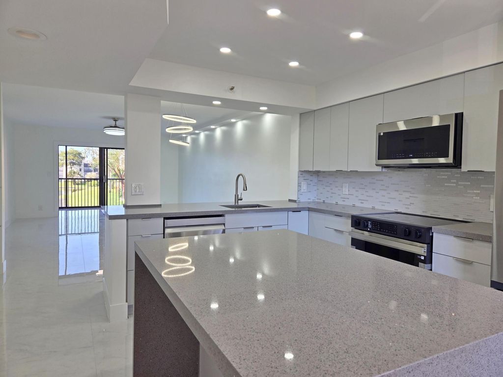 Photo of 14460 Strathmore Lane #307, Delray Beach, FL 33446 (MLS # B26005408)