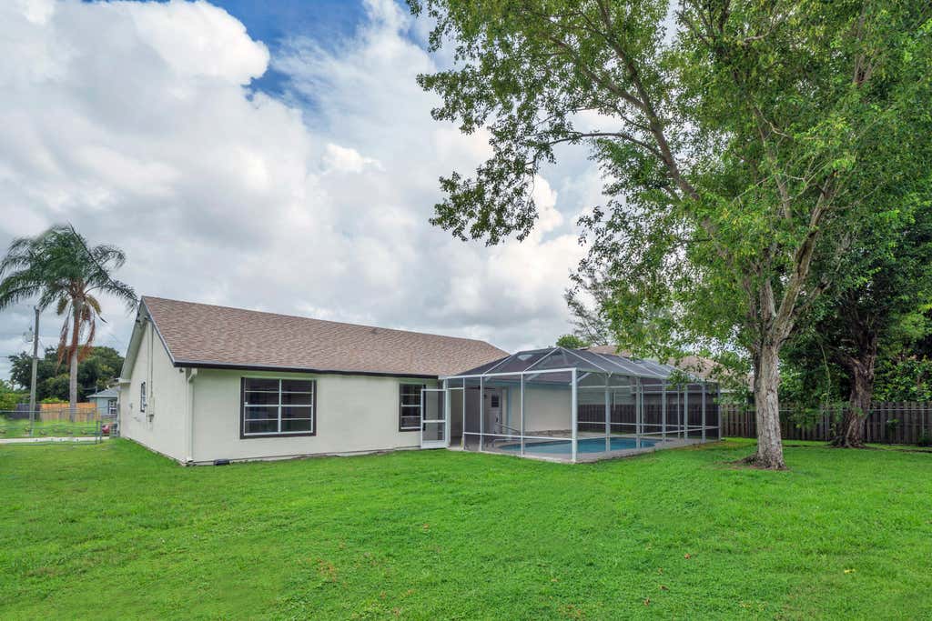 Photo of 742 SW Nichols Terrace, Port Saint Lucie, FL 34953 (MLS # B26062733)