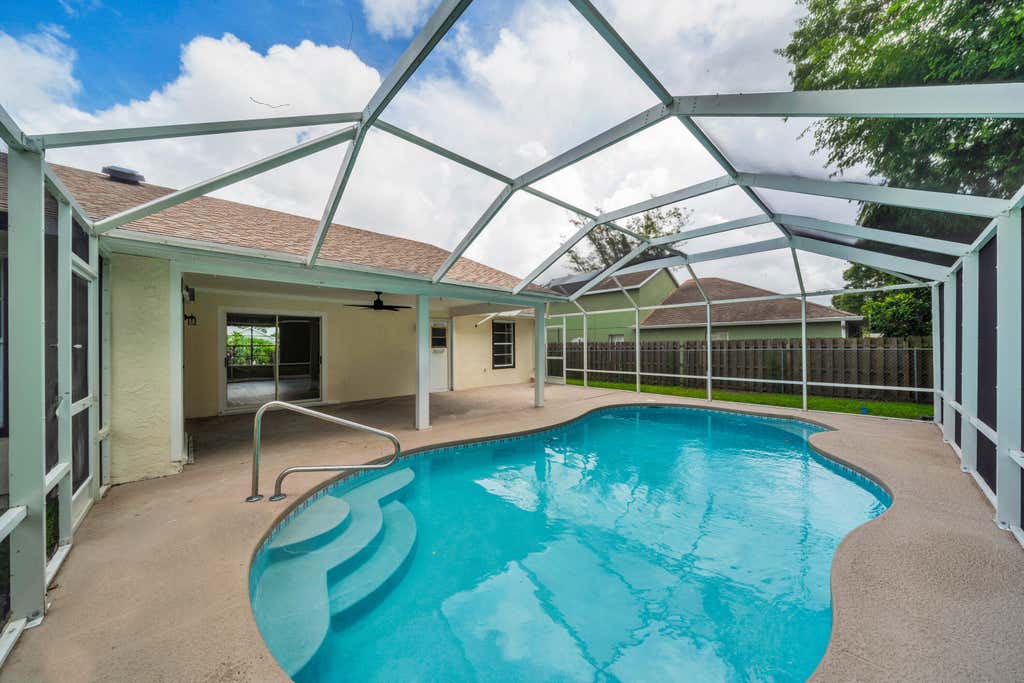Photo of 742 SW Nichols Terrace, Port Saint Lucie, FL 34953 (MLS # B26062733)