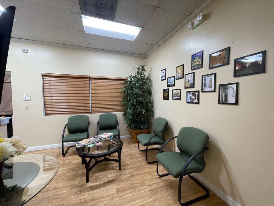 Well-maintained commercial bay available for lease in a highly accessible Fort Lauderdale location. This versatile space features a functional layout with a reception area, open workspace for multiple stations, a private office, and two remodeled bathrooms. Warehouse component (approx. 265 SF) includes a loft and ~20 ft ceilings with a 12 ft overhead door, offering flexibility for storage or light industrial use.Ideal for office, showroom, or service-based businesses seeking both office and warehouse functionality.