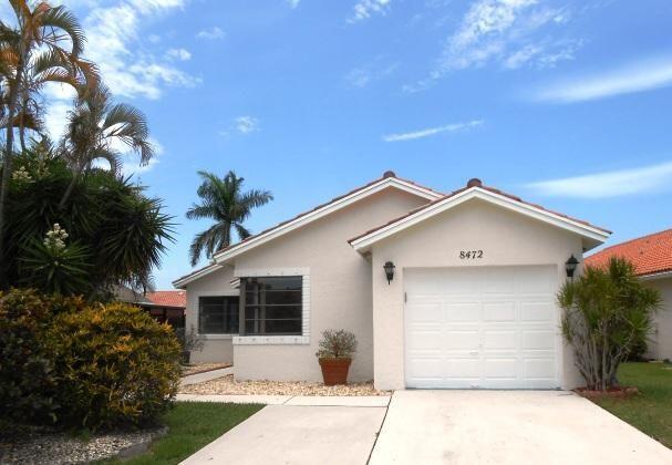 Photo of 8472 Bonita Isle Drive Dr, Lake Worth Beach, FL 33467 (MLS # R10826442)